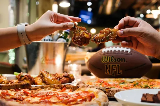 Where to Watch Football in Chicago—From $25 Beer Buckets to BOGO Pizzas in the 4th Quarter