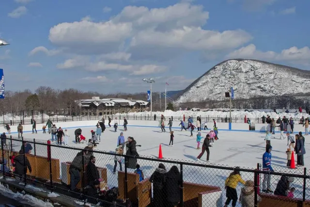 Voted “Best Of The Hudson Valley”: This 100-Year-Old Outdoor Ice Skating Rink Is Tucked Under Dramatic Cliffs Just A Short Drive From Manhattan
