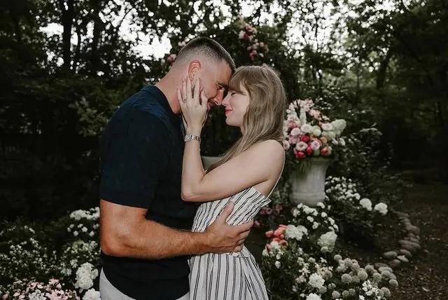 For One Day Only, Snap A Photo In Front Of A Recreation Of Taylor Swift & Travis Kelce’s Floral Engagement Backdrop — For Free