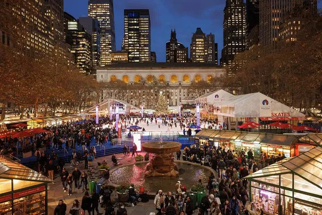 Bryant Park’s Iconic Winter Village Is Opening For The Season Very Soon—Get Ready For Skating, Shopping, & Holiday Cheer