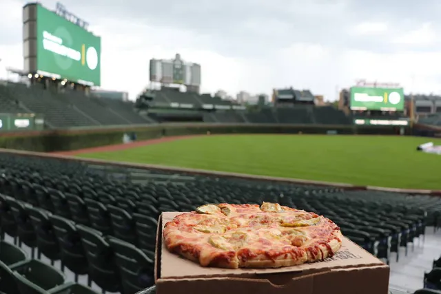 Heading to the Cubs Game This Weekend? You Can Grab a Pickle Pizza at Wrigley Field