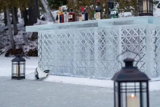 This Charming Adirondack Resort Feels Like A Snowy Alpine Village — With The Most Stunning Ice Bar In The Country Built On A Frozen Lake And Drinks Served In Chilled Ice Glasses