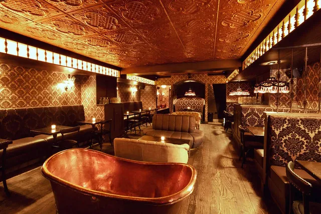 One of the Best Speakeasies in the U.S. is Hiding Behind an NYC ‘Coffee Shop’ — With a Secret Brass Bathtub and Gin-Soaked Cocktails