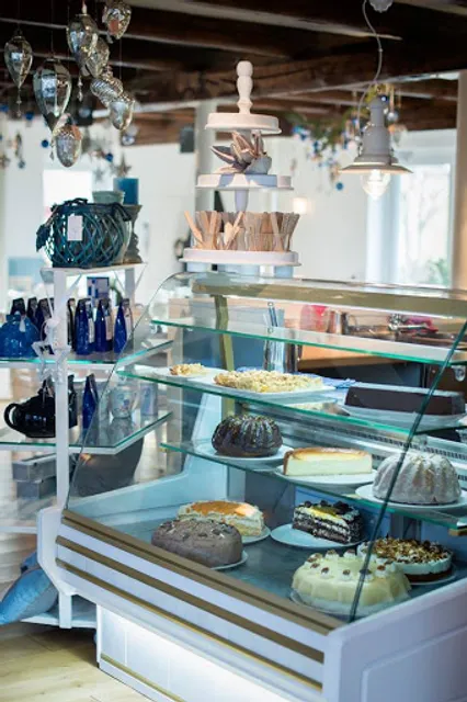 Hof Schwansen - Café und Ferienwohnungen ( Schönhagen / Ostsee )