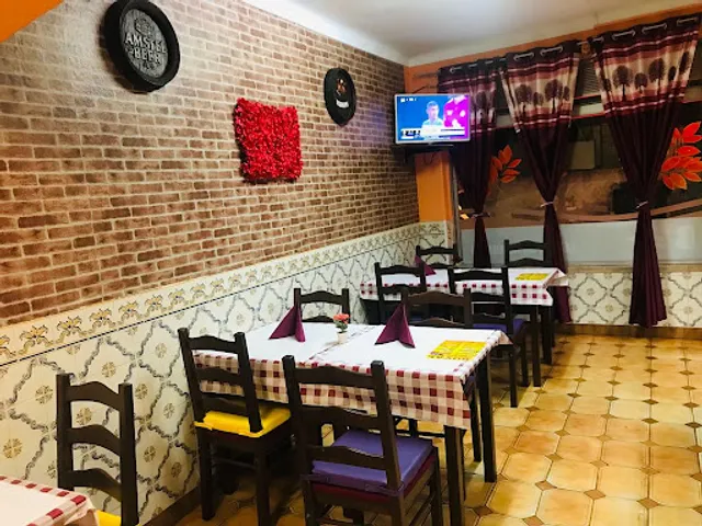 Royal indian Restaurant kebab pizza