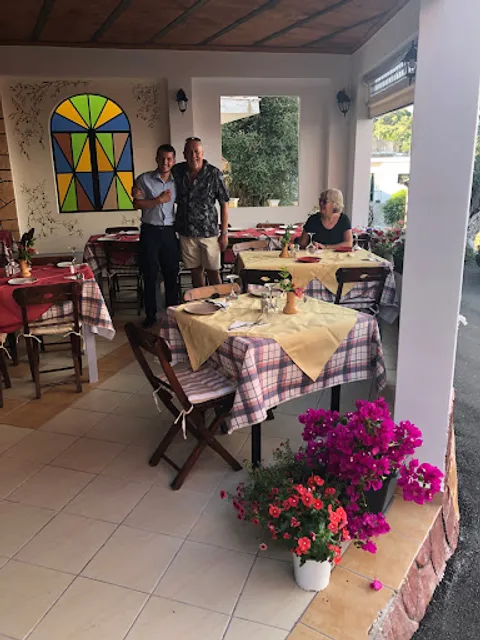 Tassos Village Grill,