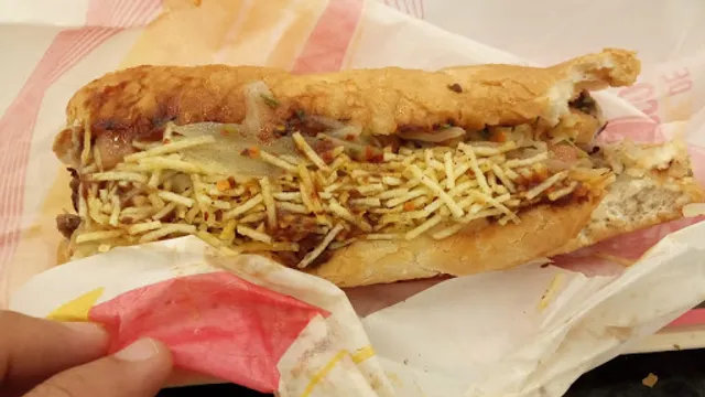 COMPANHIA DO CHURRASCO X SANDUICHERIA