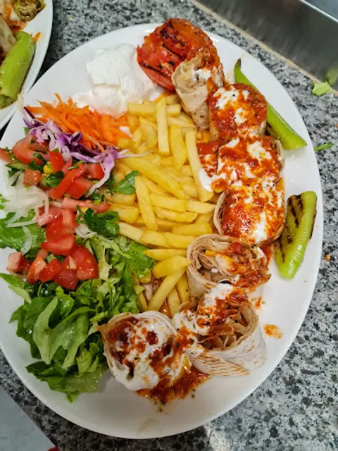 Alibaba kebab , tacos , pizza