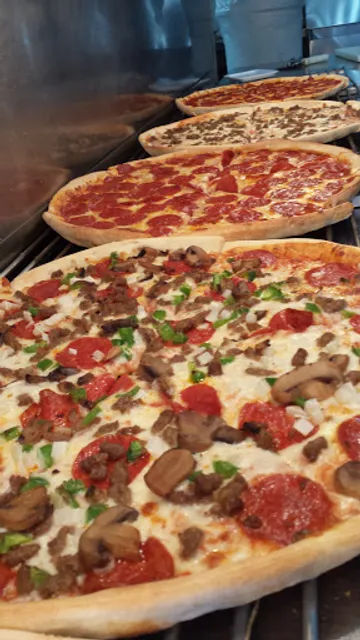 Geno's Pizza By The Slice