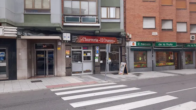 Churrería Asador EL CRUCERO Pollos asados Empanaditas