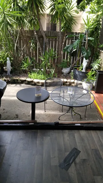 The Four Seasons & Den Patio Bar