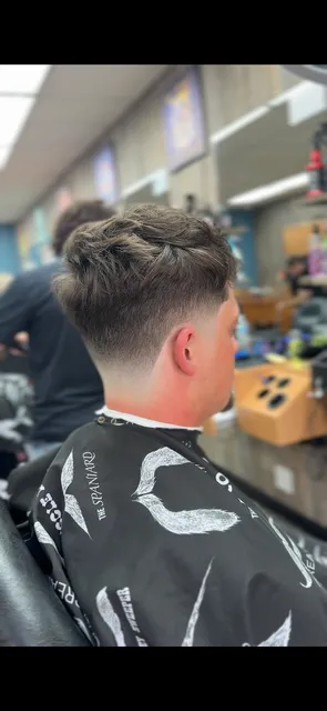 Kingdom Salon / Barbershop