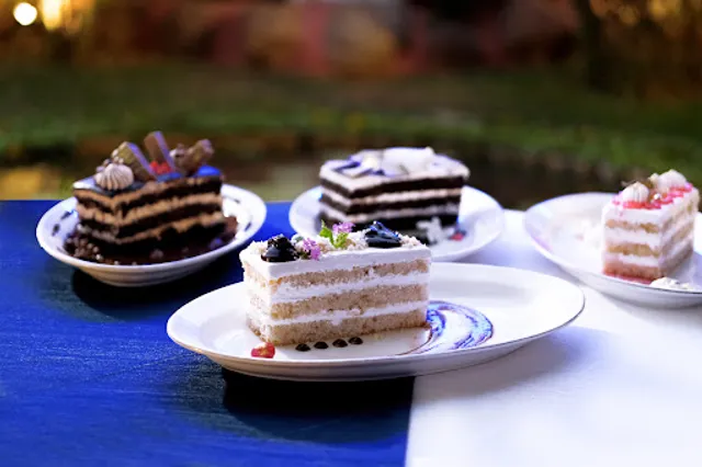 Orange Bowl Restaurant and Back Lawn @ Celebrity Resorts