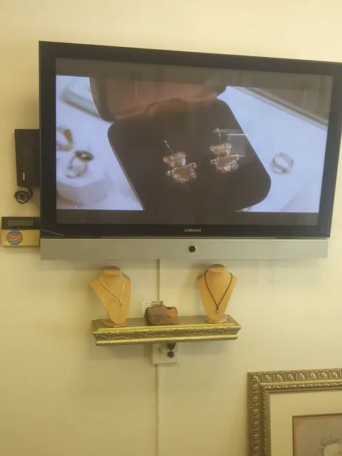 Mixa jewelers.Sell/Buy,custom orders,engraving,pawn jewelry.