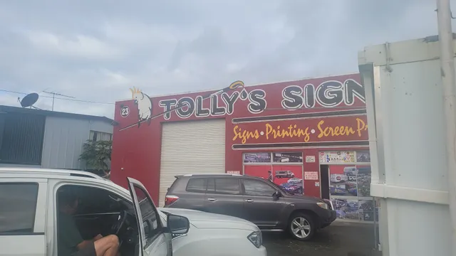 TOLLYS SIGNS.