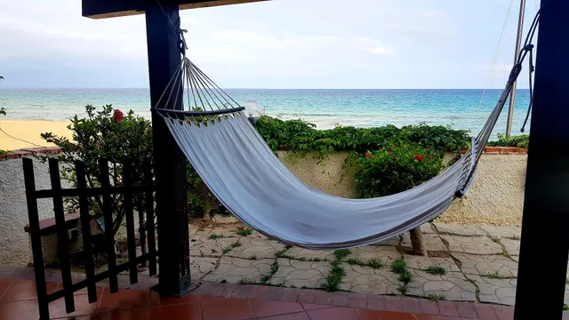 Casa la conchiglia sulla spiaggia
