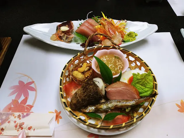 （有）丸市本店