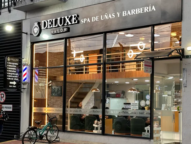 Deluxe Salón Spa de uñas, peluquería y barbería
