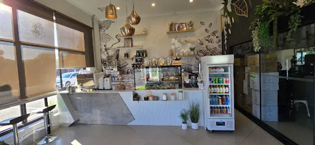 Hugs and Mugs Barber