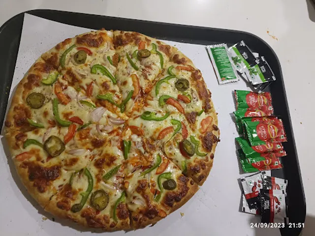 Delicious Pizza And Multi Cuisine Restaurant.