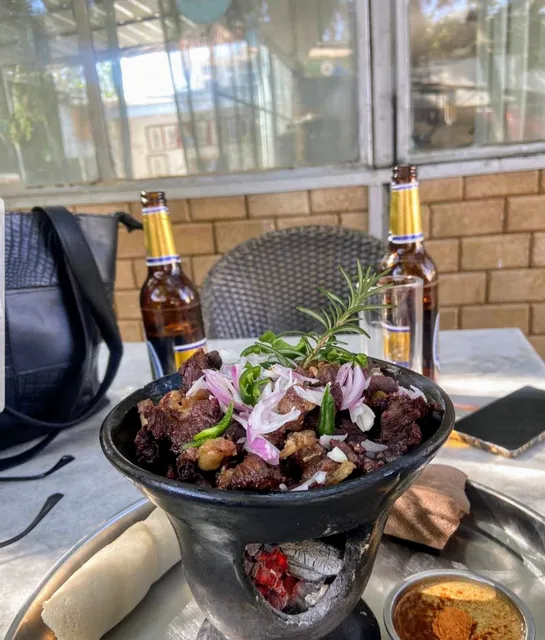 Min yetebes Bar & Restaurant | Bole | ምን ይጠበስ ባርና ሬስቱራንት | ቦሌ