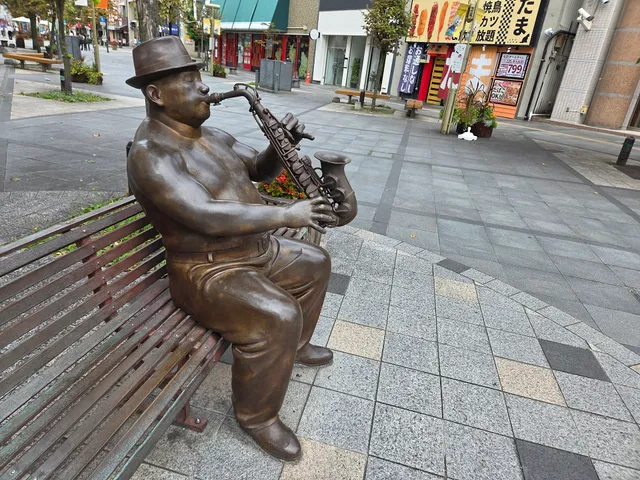 Saxophonist and his Cat