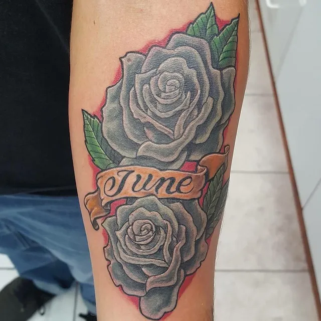 Blue Horseshoe Tattoo and Body Piercing