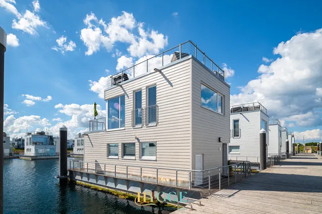 Schwimmendes Haus Hygge - Ferienhaus Olpenitz