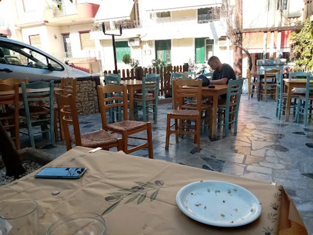 Το ουζερί του Κουτσομύτη