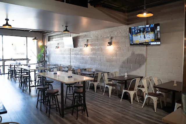 The Ghent • Self-Pour Gastropub • Roof Top Bar & Event Venue