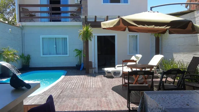 Casa com piscina temporada