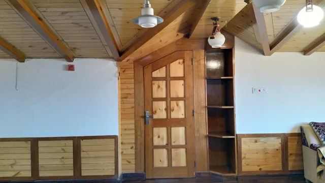 Wintry group of hotel and home stays and cottages.