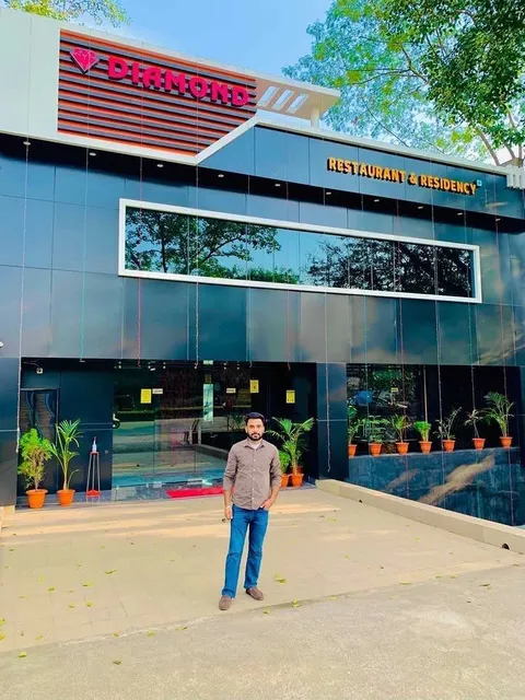 Capital O 86218 Diamond Restaurant & Residency