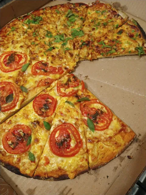 Las Delicias Del Gordo Pizzería