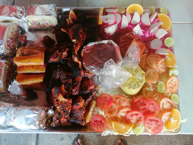 POLLOS ASADOS AL CARBÓN ELY Y MAR