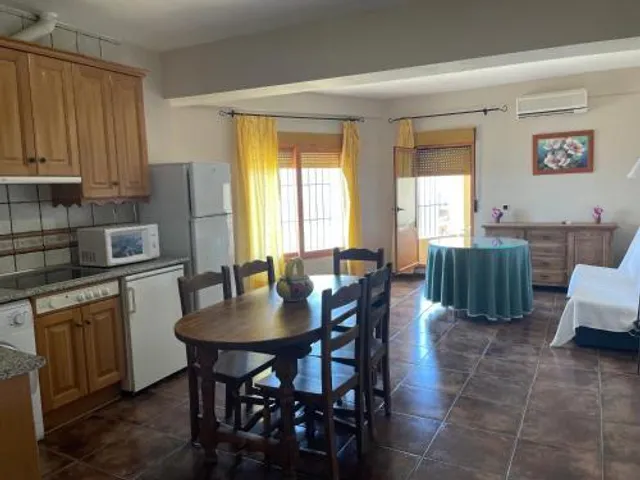 Apartamentos y Cafetería Adarve