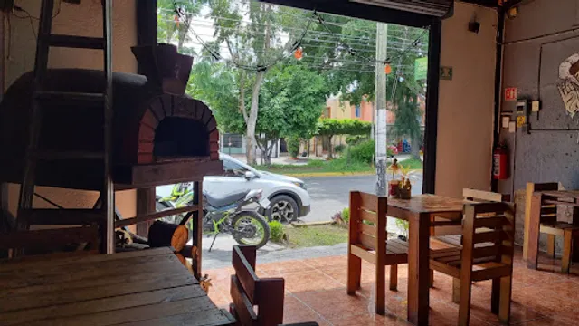 Pomorrois pizza a la leña