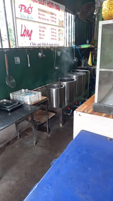 ຮ້ານຕັດຫຍິບ ດົງປາແລບ