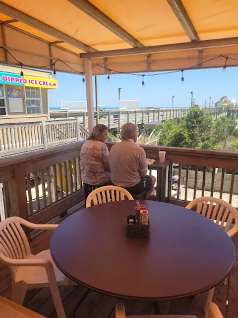 Groupers At The Pier