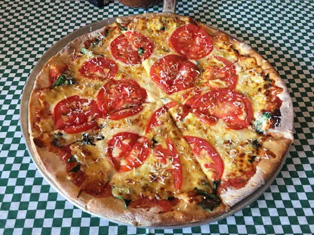 La dichoza pizza a la leña