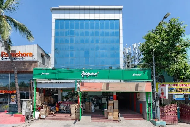 OYO Palm Shore Residency Near Shri Ayyappan Temple