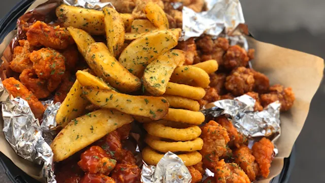 Mr. Wings Boneless y Alitas