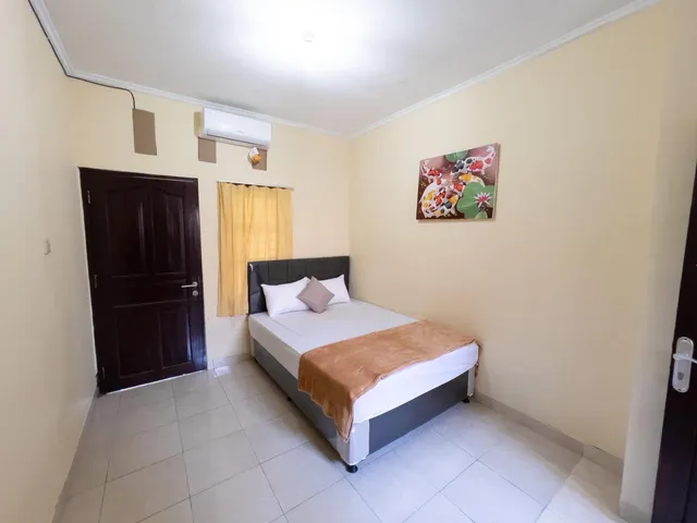 OYO 90907 Handika Jaya Bs