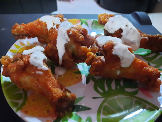 Tacos y alitas El águila J.R