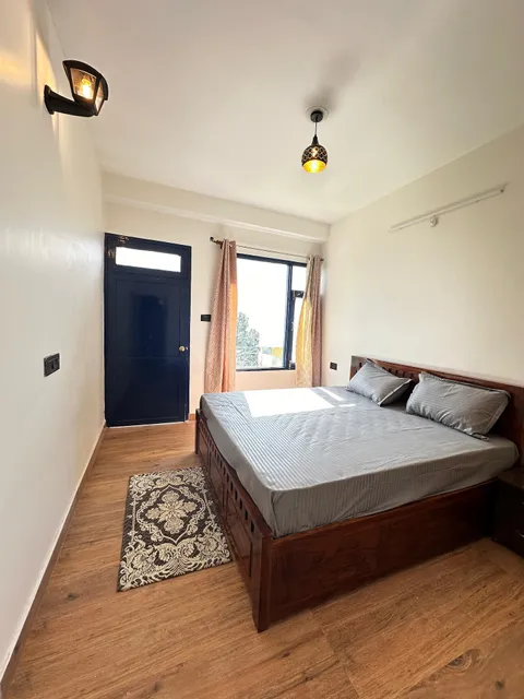 Whistling Pines Homestay ( mountain facing rooms )