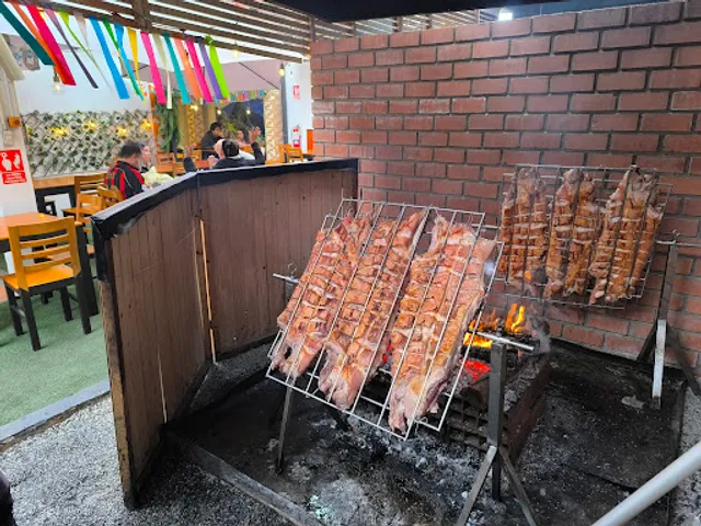 Chancho al Palo de Juanito
