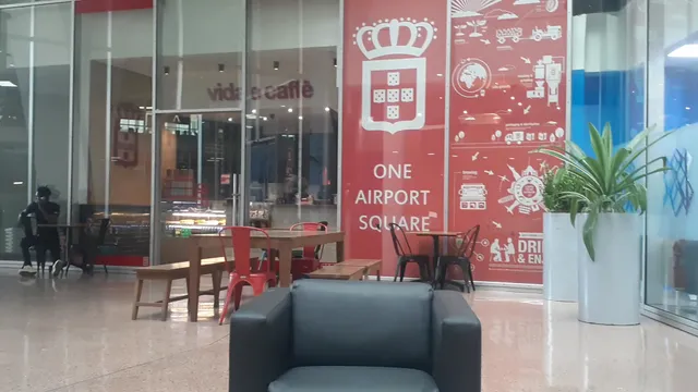 vida e caffè - One Airport Square
