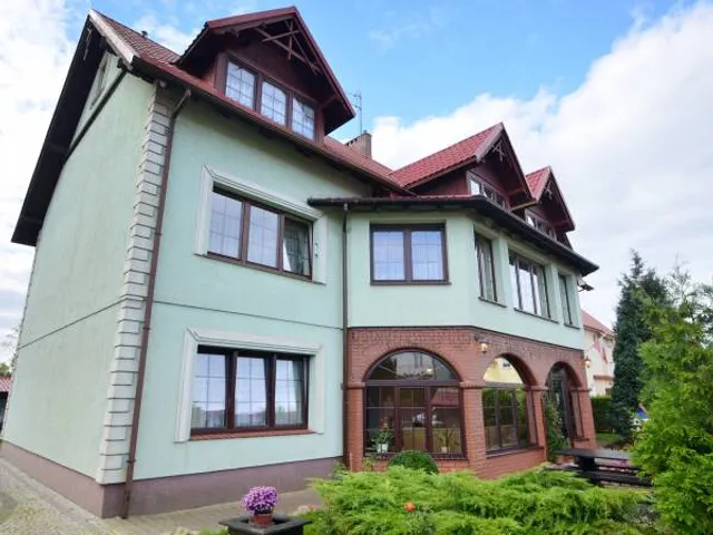 Pensjonat "Magnat" Pokoje Gościnne w Dźwirzynie