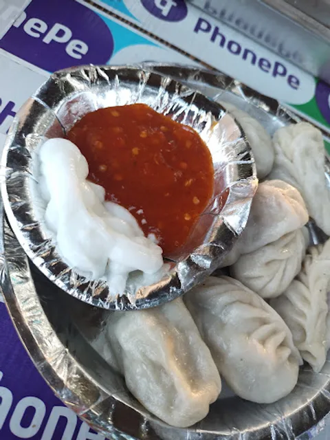 Zaika kathi Roll and Momos