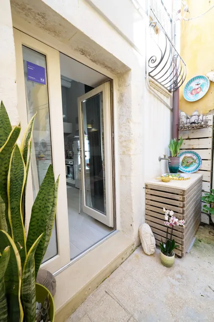 Casa di Ortigia, via Ronco Menandro 3